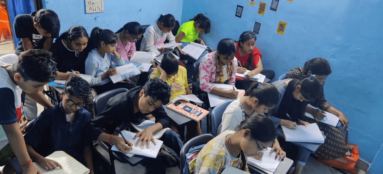 Students learning together at Dhairye Classes
